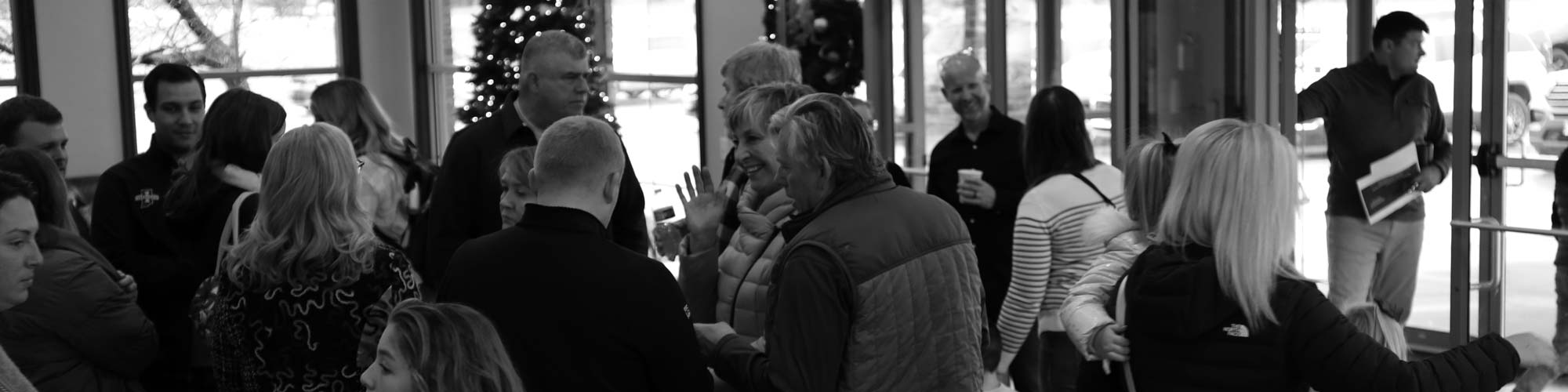 group of great oaks church parishioners talking reception area